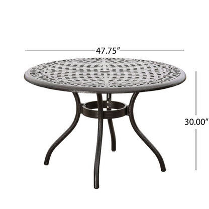 The Tranquilius Outdoor Round Dining Table features a black metal lattice tabletop, curved legs, a circular support ring, and an umbrella hole. The table measures 47.75" in diameter and 30" high—perfect for stylish outdoor dining.