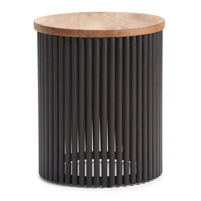 The Demy Accent Table in Natural/Black features a round wooden top and a cylindrical black metal base with vertical slats for an open, airy look.