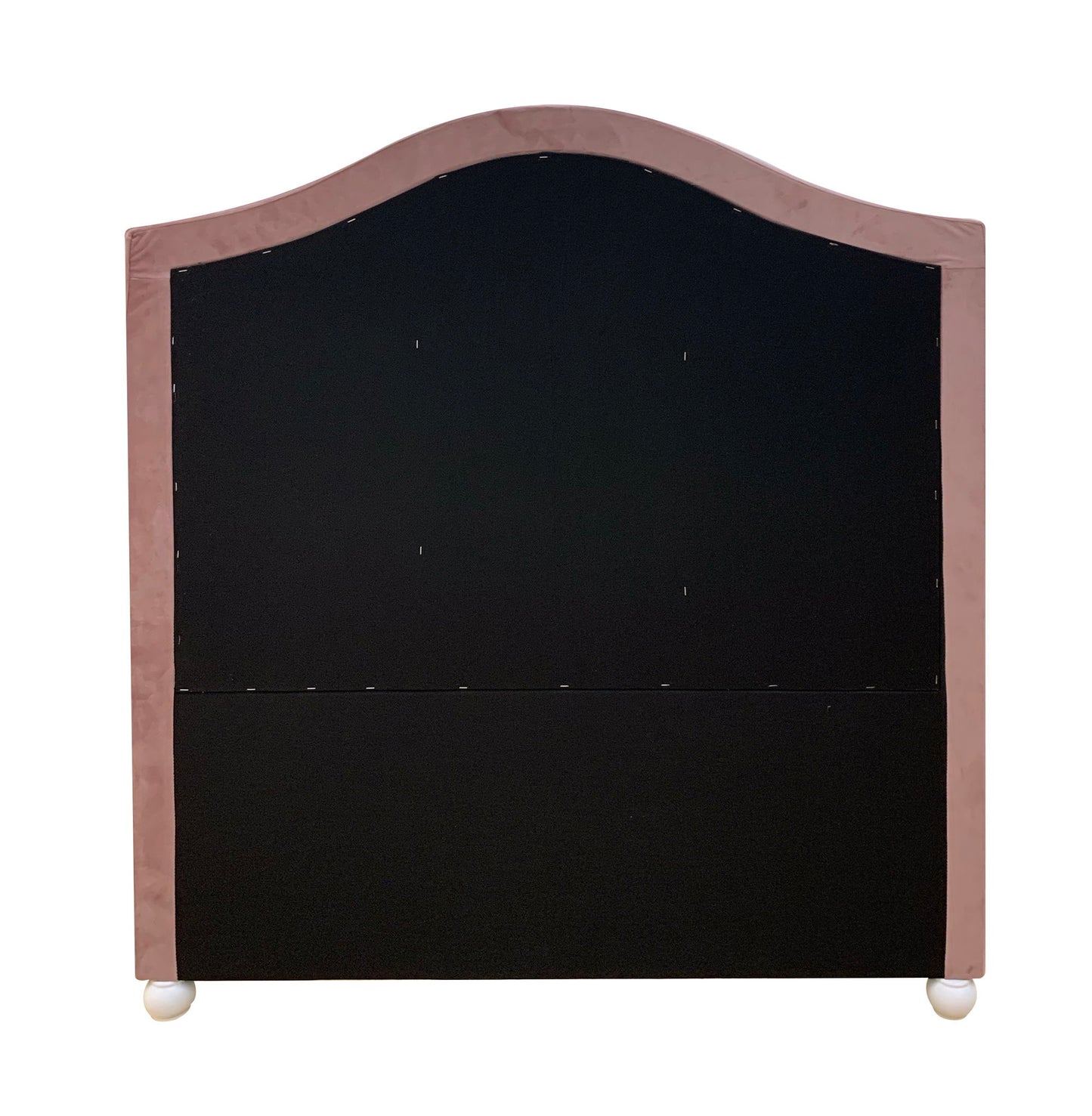 The Reggie Twin Bed features a fabric-covered headboard with a curved top, a black central panel framed in light pink, and stands on two small round white feet.