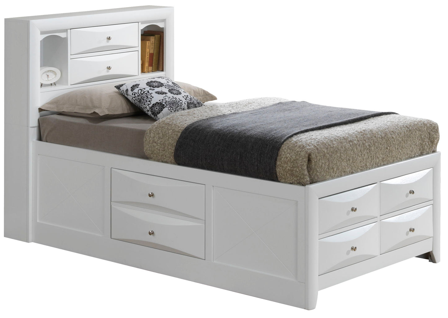 The Marilla Storage Bed With Bookcase Headboard features built-in storage drawers underneath and shelves in the headboard, topped with pillows, a patterned cushion, and neatly folded bedding.