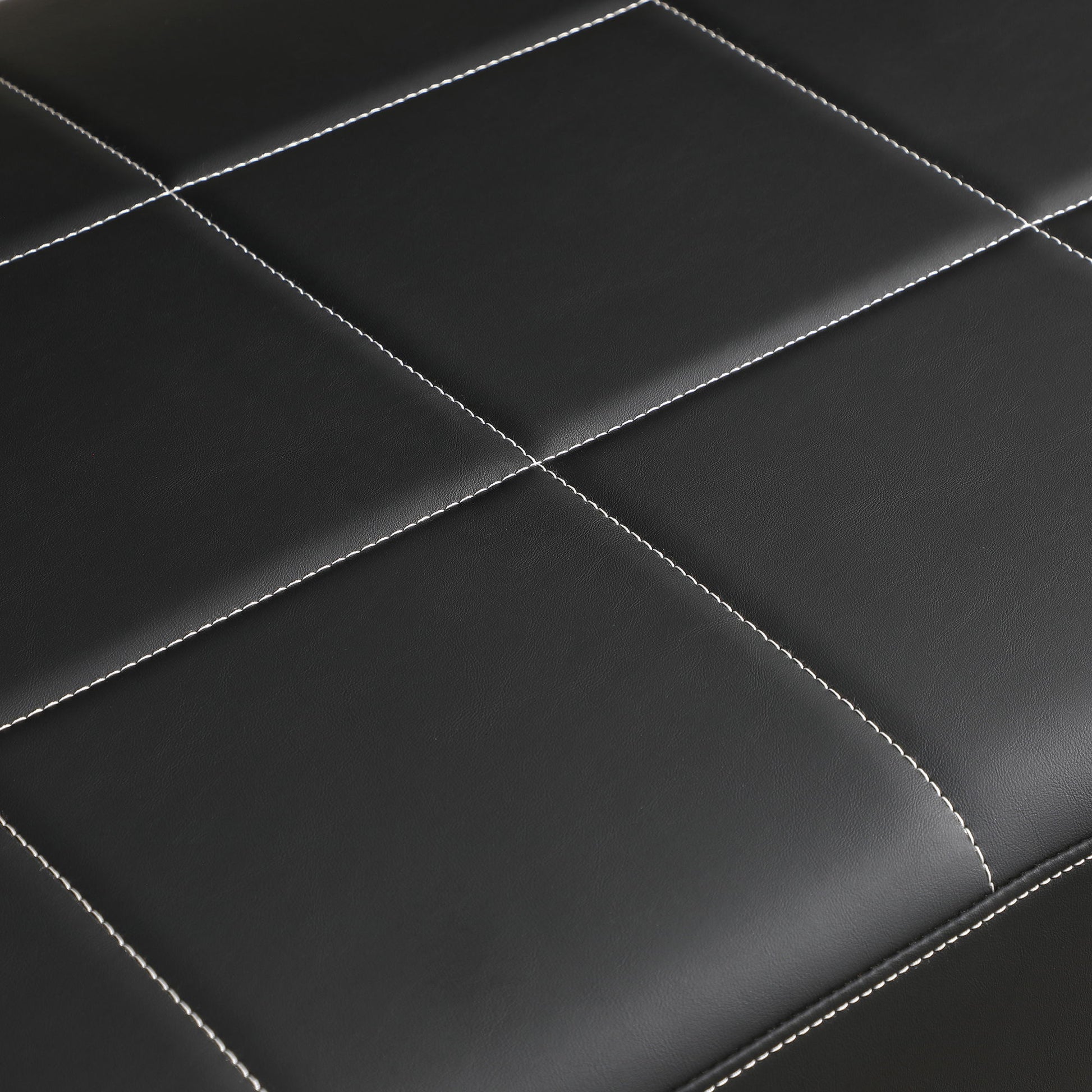 Close-up of the Modern Upholstery Accent Loveseat Sofa's black leather with white grid stitching, highlighting its elegant design and golden metal arms.