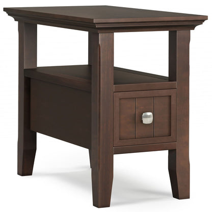 The Acadian Narrow Side Table With Drawer in brown features a square top, small front drawer with silver square knob, lower shelf, slightly tapered legs, and a simple classic design.