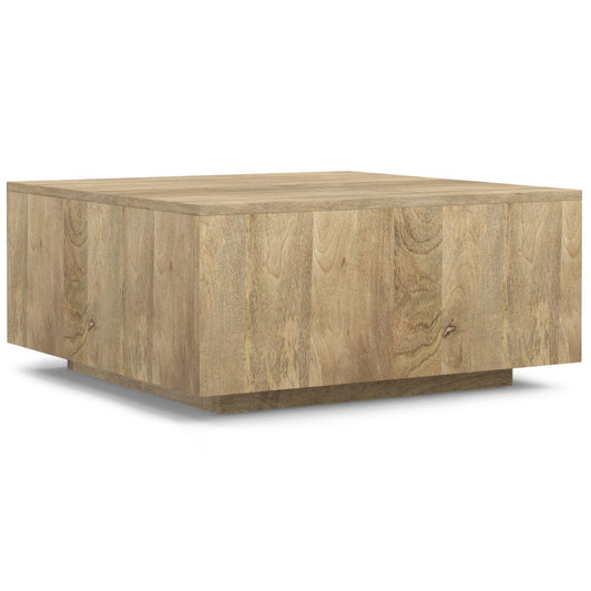 The Lockhart Square Coffee Table features a natural light wood finish and a minimalist solid block design, displayed against a plain white background.