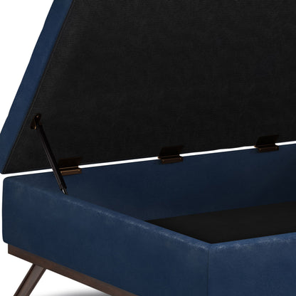 A close-up of the Owen Multifunctional Square Coffee Table Storage Ottoman in blue upholstery, showing its open, hinged lid and spacious empty interior compartment.