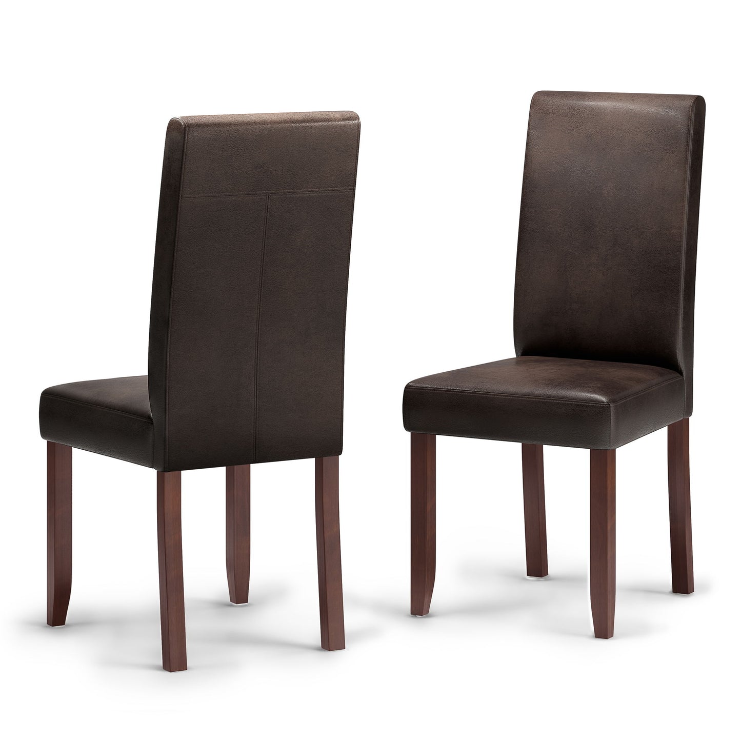 The Acadian Upholstered Parson Dining Chair set of 2 is shown in dark brown leather with wooden legs—one chair faces forward while the other is angled to reveal the back.