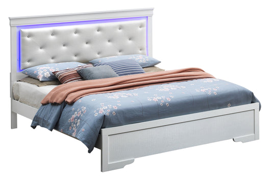 The Lorana G6590C-FB3 Full Bed in Silver Champagne features a tufted, padded headboard with a blue LED light strip. It's styled with blue floral bedding, multiple pillows, and a folded pinkish throw at the foot.
