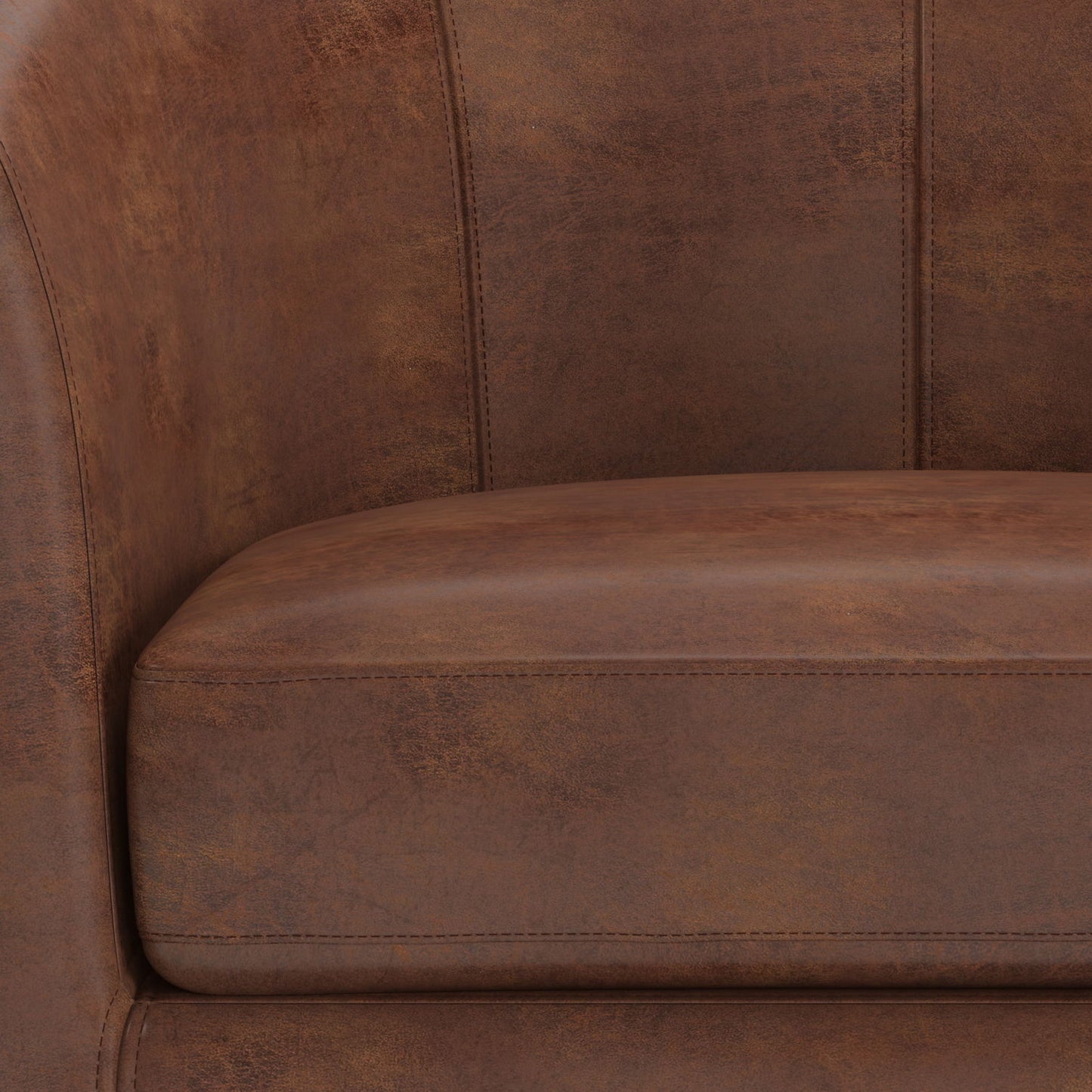 Close-up of the Austin - Handcrafted Tub Chair, featuring brown leather upholstery, a seat cushion and curved backrest with visible stitching, and a slightly distressed texture.