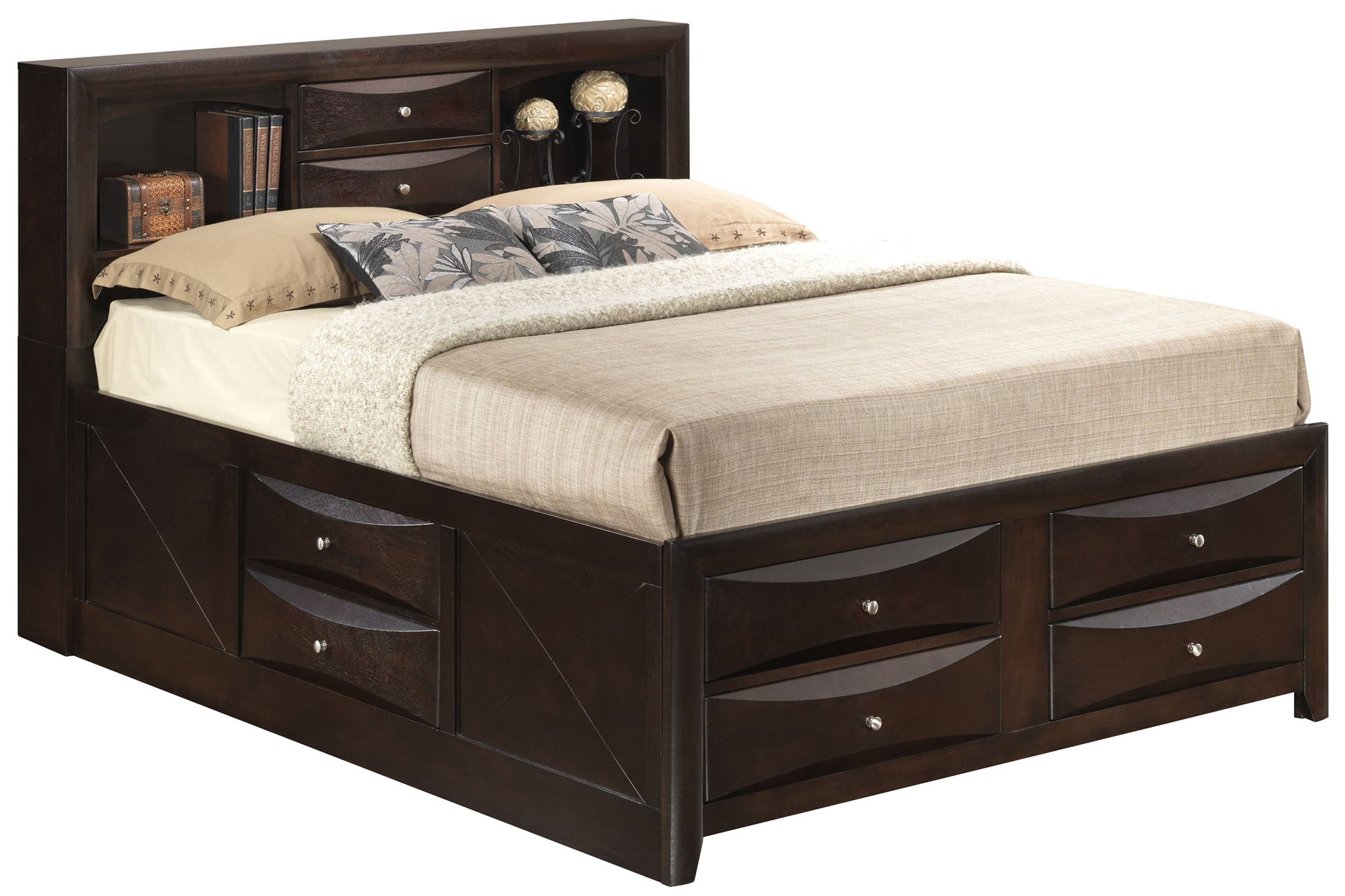 The Marilla Storage Bed with Bookcase Headboard features a dark wood finish, built-in storage drawers at the base, and a headboard with shelves and cabinets. It's shown neatly made with beige bedding and accent pillows.