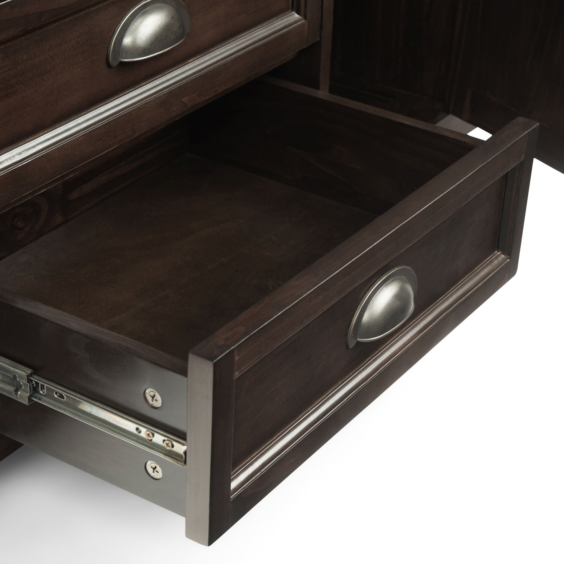 A close-up of the Burlington - TV Media Stand reveals a dark wood finish with a single open drawer, showing its empty interior. The drawer is equipped with a silver metal cup handle and metal sliding tracks.