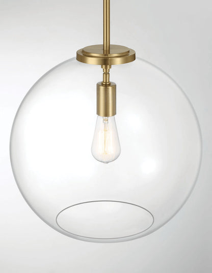 The Gleam Single Light Pendant Lamp features a gold, modern, minimalist design with an exposed filament bulb centered in a clear glass globe.