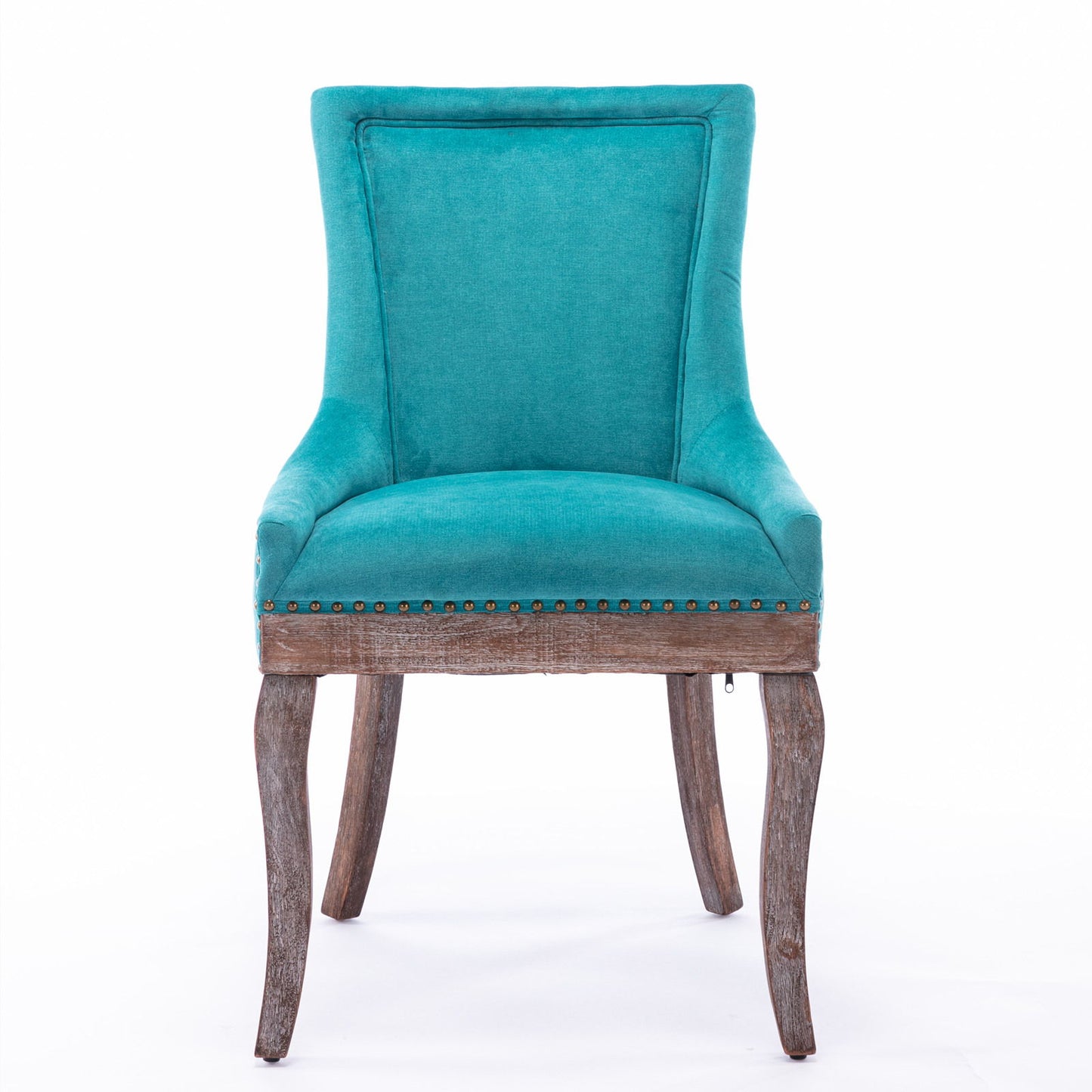 The Ultra Side Dining Chair set features thickened turquoise fabric, a high back, neutrally toned solid wood legs, and bronze nailhead trim, shown against a white background.