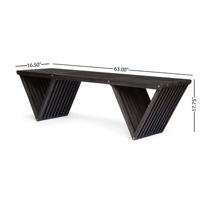 The Gloaming Outdoor Bench features a dark wood slat design, triangular base, and measures 63"W x 16.5"D x 17.75"H—perfect for modern spaces.