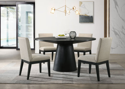 A modern dining room features the Jasper Wide Contemporary Round Dining Table Set with four beige chairs on a gray rug, a geometric chandelier above, abstract wall art, and large windows letting in plenty of natural light.