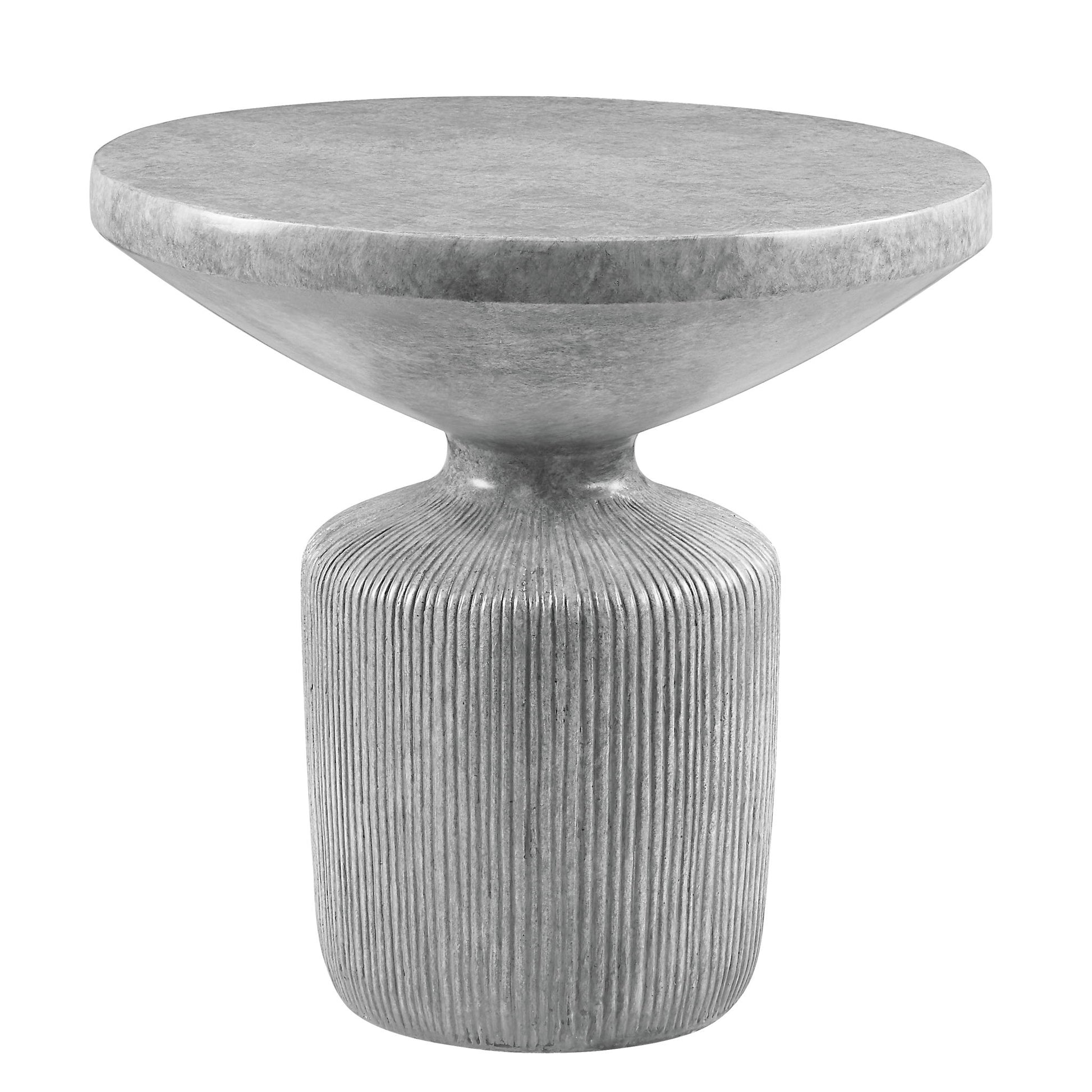 The Laddie - Weathered Table is a modern gray concrete side table with a round, wide top and ribbed cylindrical base, featuring a sculptural minimalist design and smooth tabletop finish.
