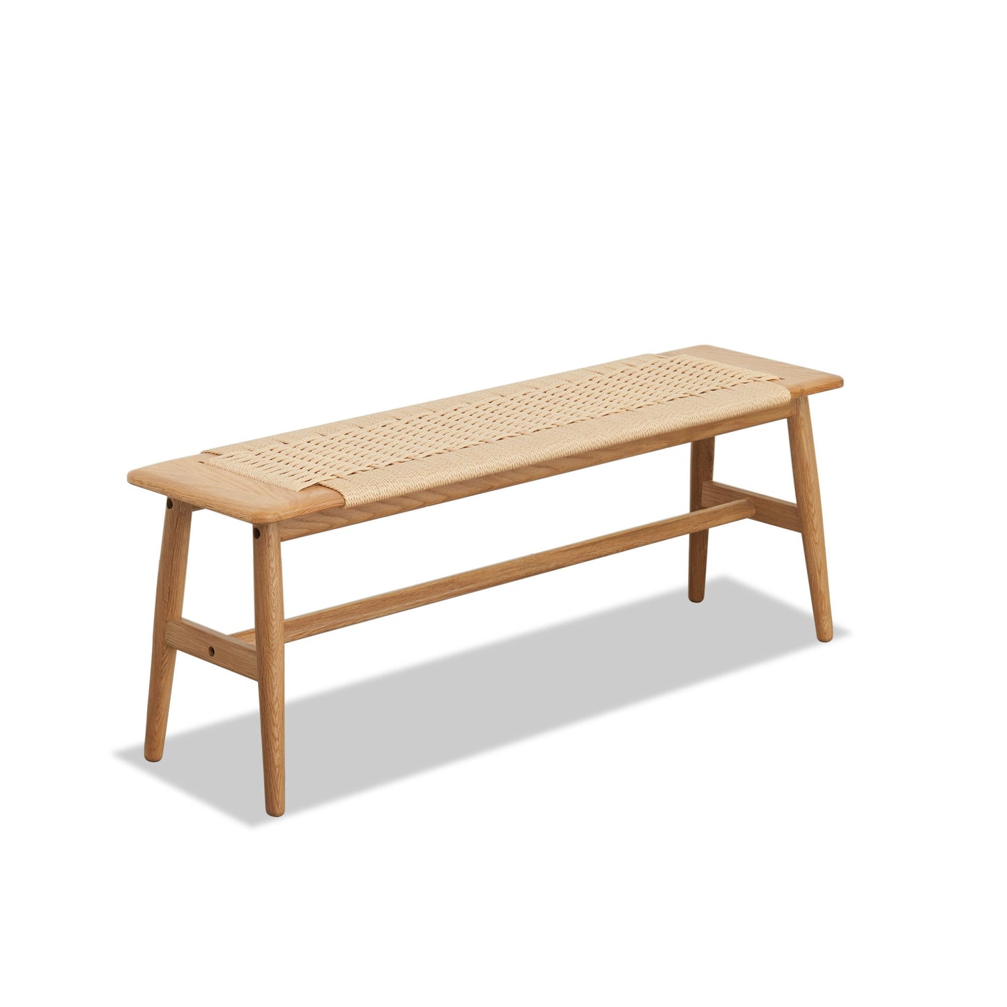 The Woven Design Dining Bench for dining room or bedroom features a natural oak frame and woven rattan seat with a simple, minimalist style, shown against a white background.