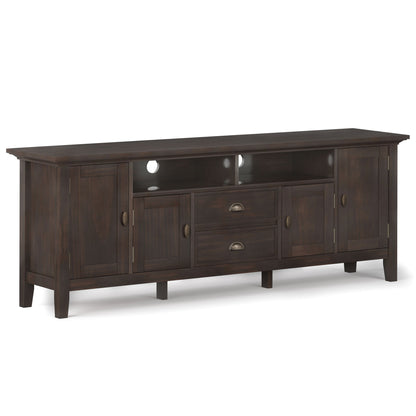 The Redmond - Handcrafted TV Media Stand features dark wood, four cabinet doors, two central drawers, and two open shelves with cable management holes on the back panel.