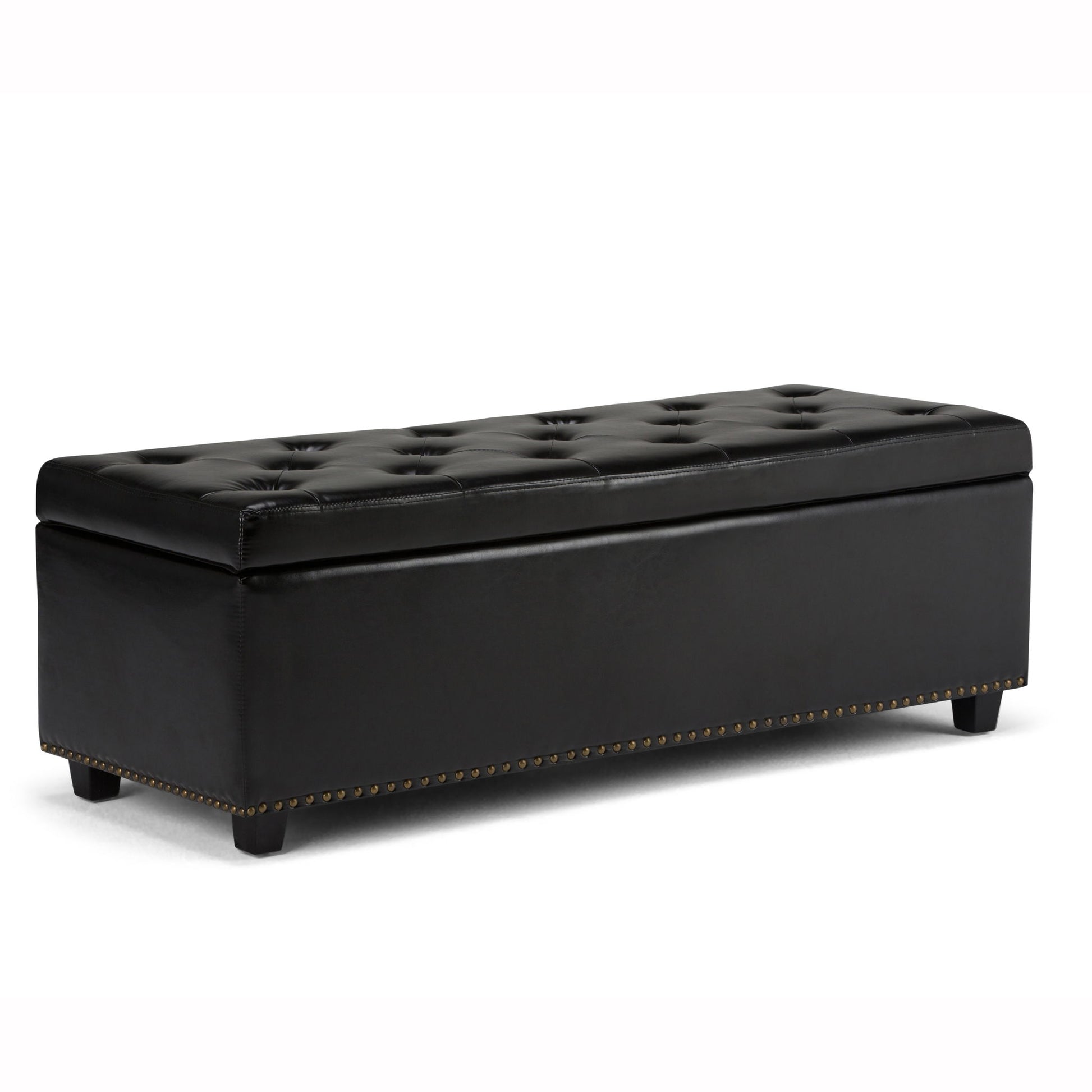 The Hamilton Upholstered Storage Ottoman features a rectangular black leather design with a tufted top, low wooden legs, and brass nailhead trim along the bottom edge.
