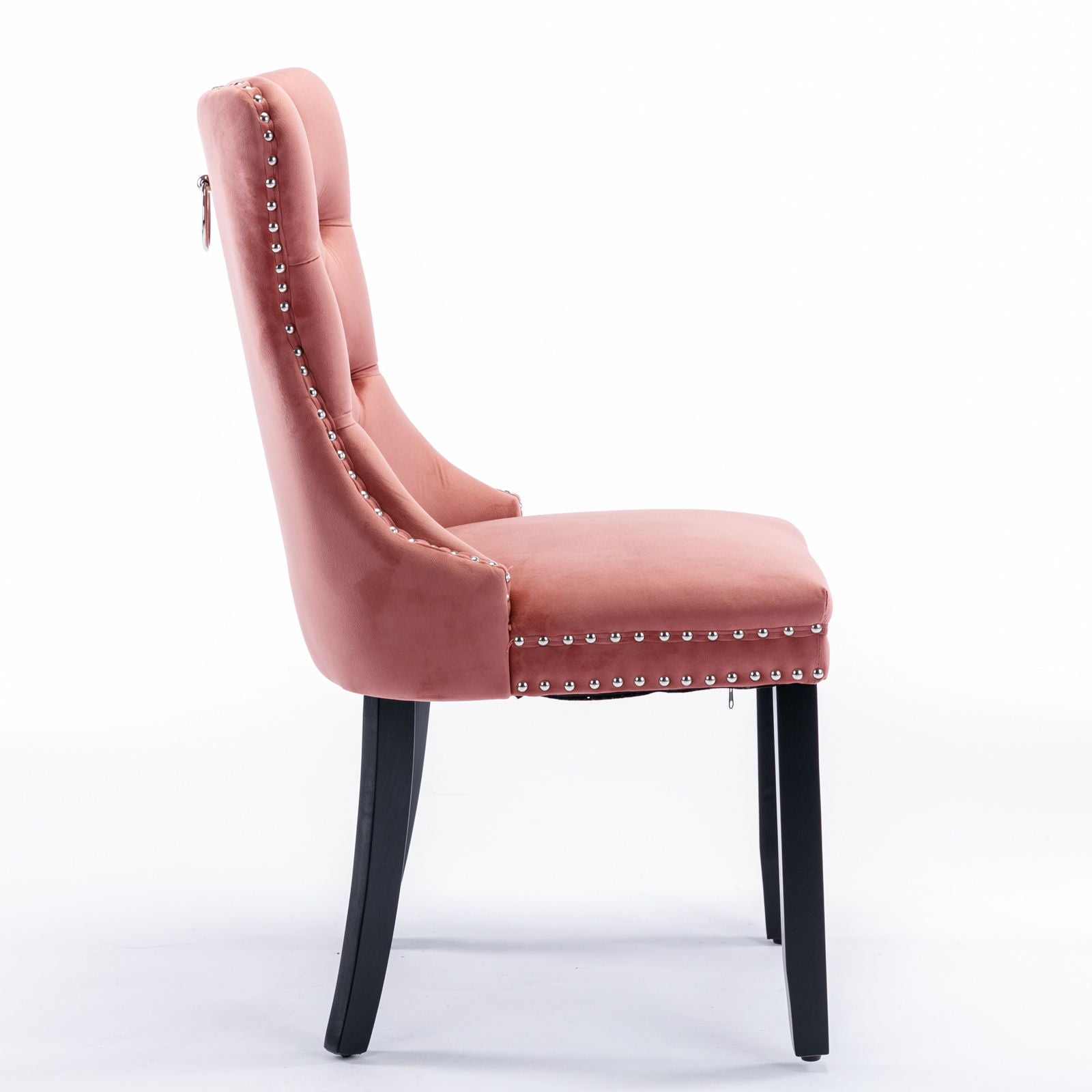 Side view of the Nikki Modern High-End Tufted Velvet Upholstered Dining Chair with silver nailhead trim and black wooden legs, shown against a plain white background. Set includes 2 contemporary solid wood chairs.