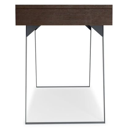 The Lowry - Handcrafted Desk features a dark wooden top and slim, angled metal legs in a minimalist design, shown from the front against a plain white background.