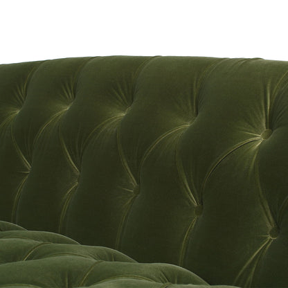 Close-up of the La Rosa - Victorian Chesterfield Tufted Sofa’s plush, dark green velvet backrest with button detailing, set against a plain white background.
