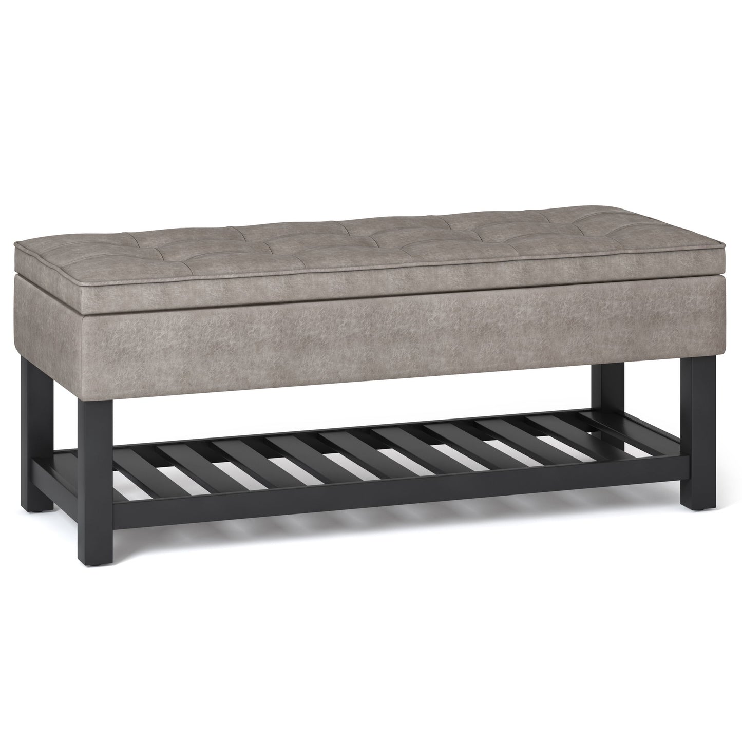 The Cosmopolitan Storage Ottoman Bench features a rectangular gray upholstered seat with a tufted top, black wooden legs, and an open slatted lower shelf.