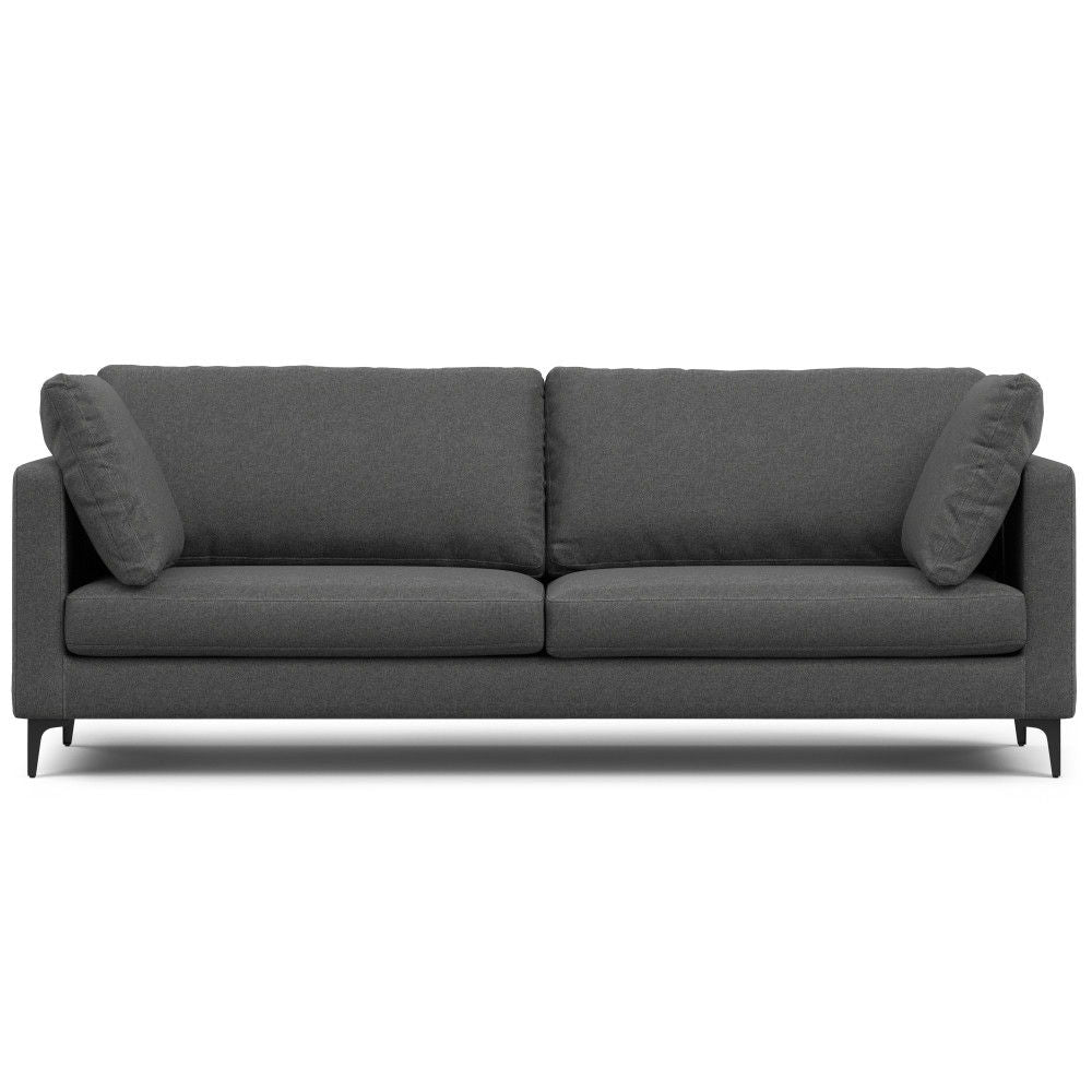The Ava Mid Century Sofa features a modern dark gray design with two seat and back cushions, two matching side pillows, clean lines, and slim black legs.
