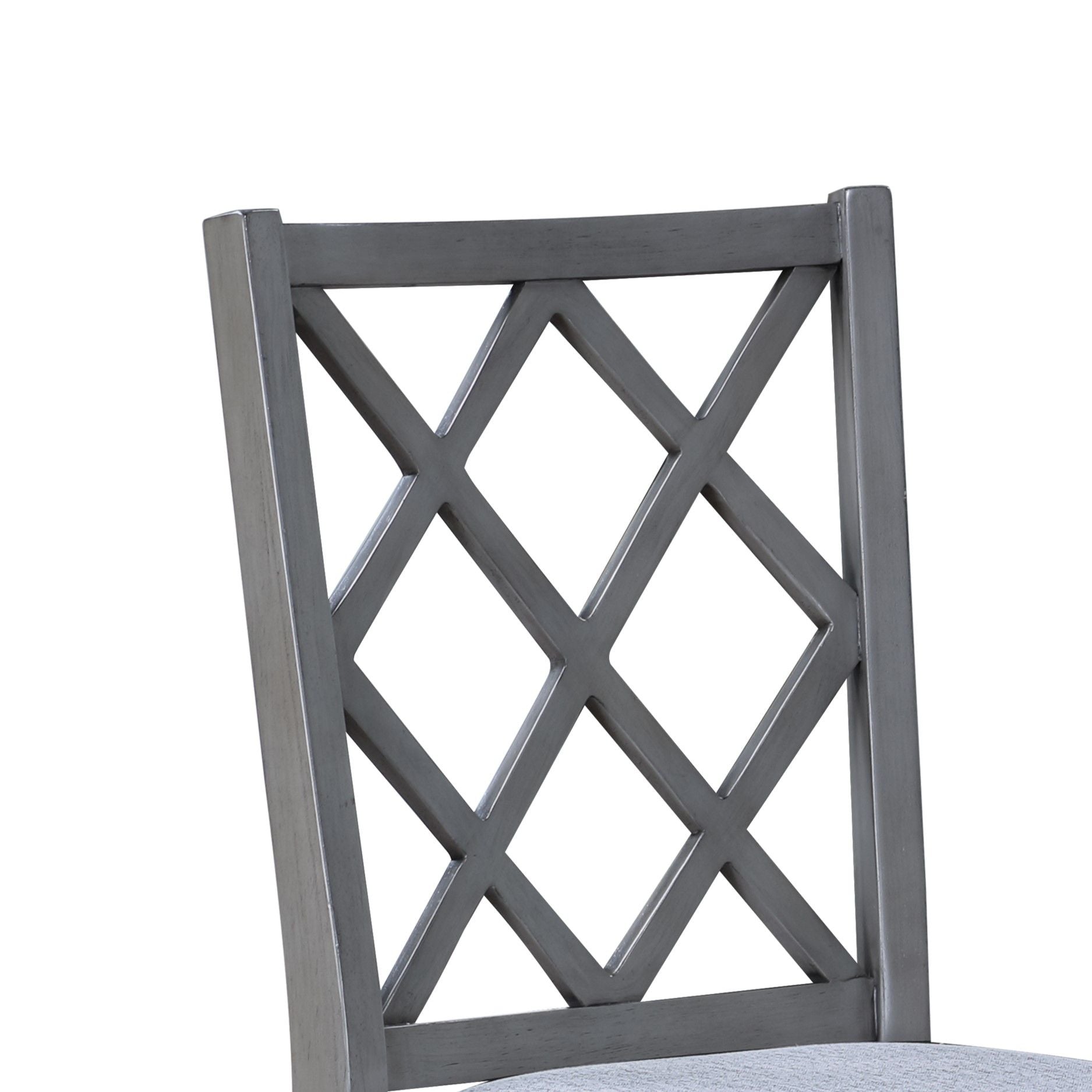 Close-up of the Carlisle - Cross Back Side Dining Chair's gray wooden diamond lattice backrest, partially visible against a plain white background.