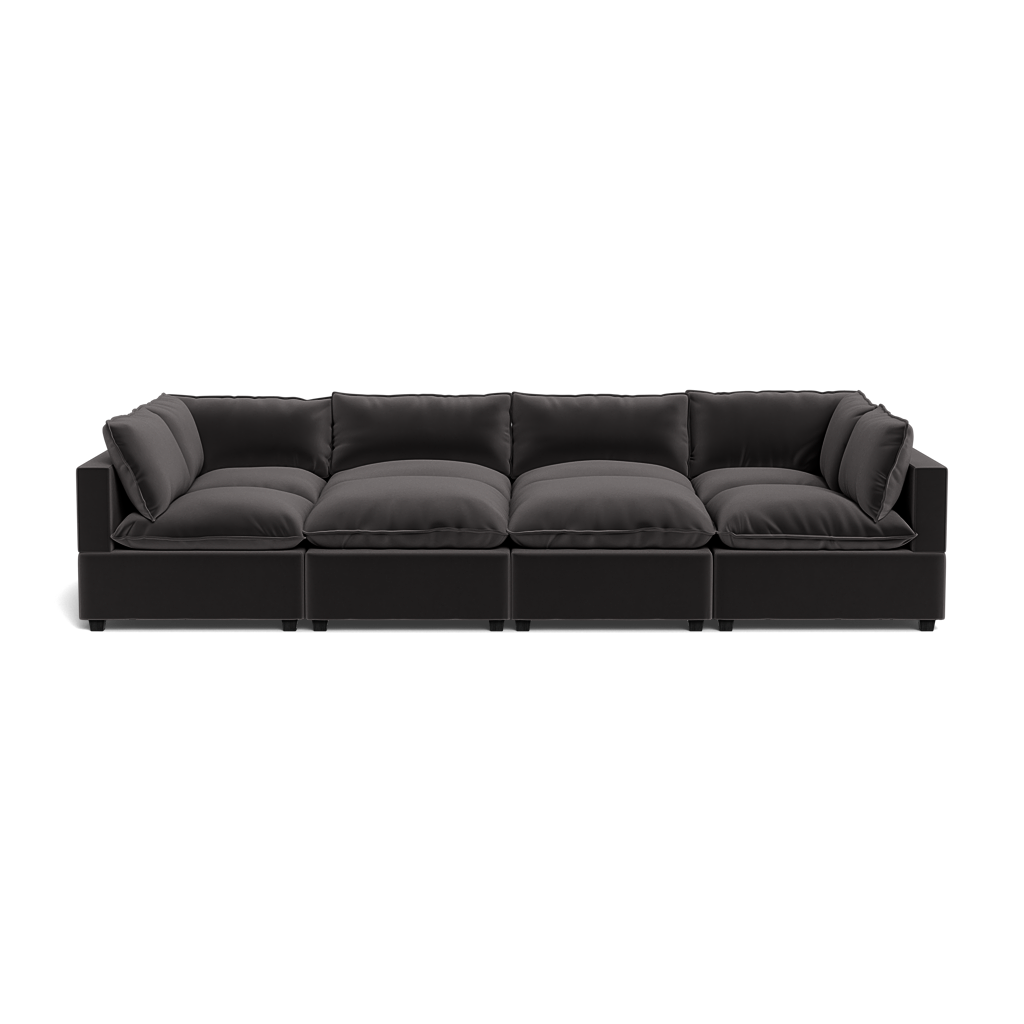 The Kova Pillow Cushion Grand Pit is a modern black sectional sofa featuring five cushioned seats with matching back and side pillows, shown from the front on a white background.