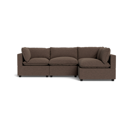 The Kova Pillow Cushion L-Shape, shown from the front against a plain black background, features a brown L-shaped design with three seat cushions, three back cushions, and two armrest pillows.