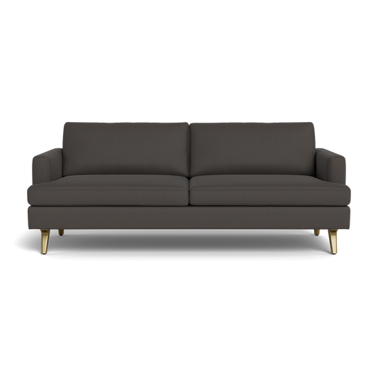 The Lido Sofa 75" features a modern dark gray design with two seat cushions, two back cushions, slim armrests, and short gold legs, displayed against a plain black background.