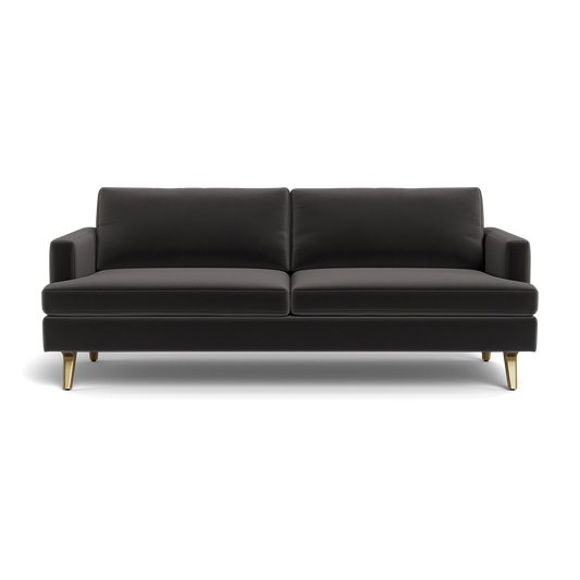 The Lido Sofa 75" is a modern black sofa featuring two seat cushions, two back cushions, and short, angled gold legs, displayed from the front against a plain black background.