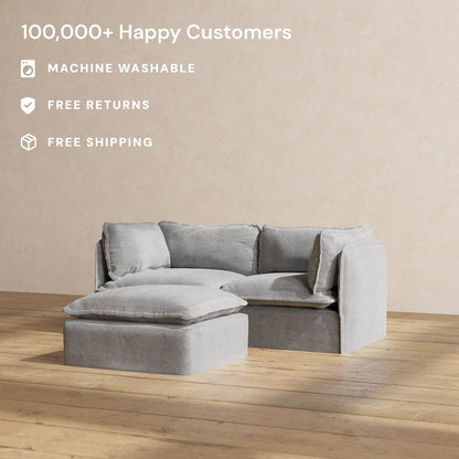 A stylish and contemporary Modular Performance 2-Seater in light gray, paired with a matching ottoman, sits elegantly on a wooden floor. Text on the image showcases features such as "100,000+ Happy Customers," "Machine Washable," "Free Returns," and "Free Shipping.