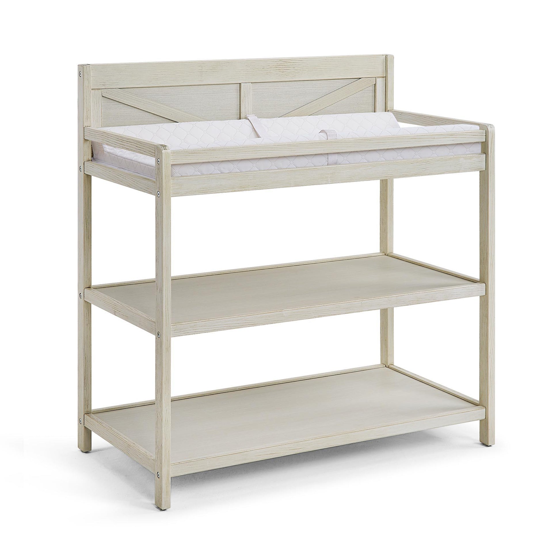 The Barnside - Changing Table Vintage features a rustic, light wood finish, two open storage shelves, and comes with a white changing pad on top.