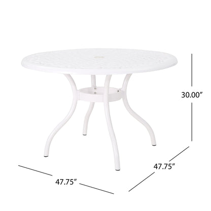 The Tranquilius Outdoor Round Dining Table features a white metal lattice-patterned top, four curved legs, an umbrella hole, and measures 47.75" in diameter by 30" high.