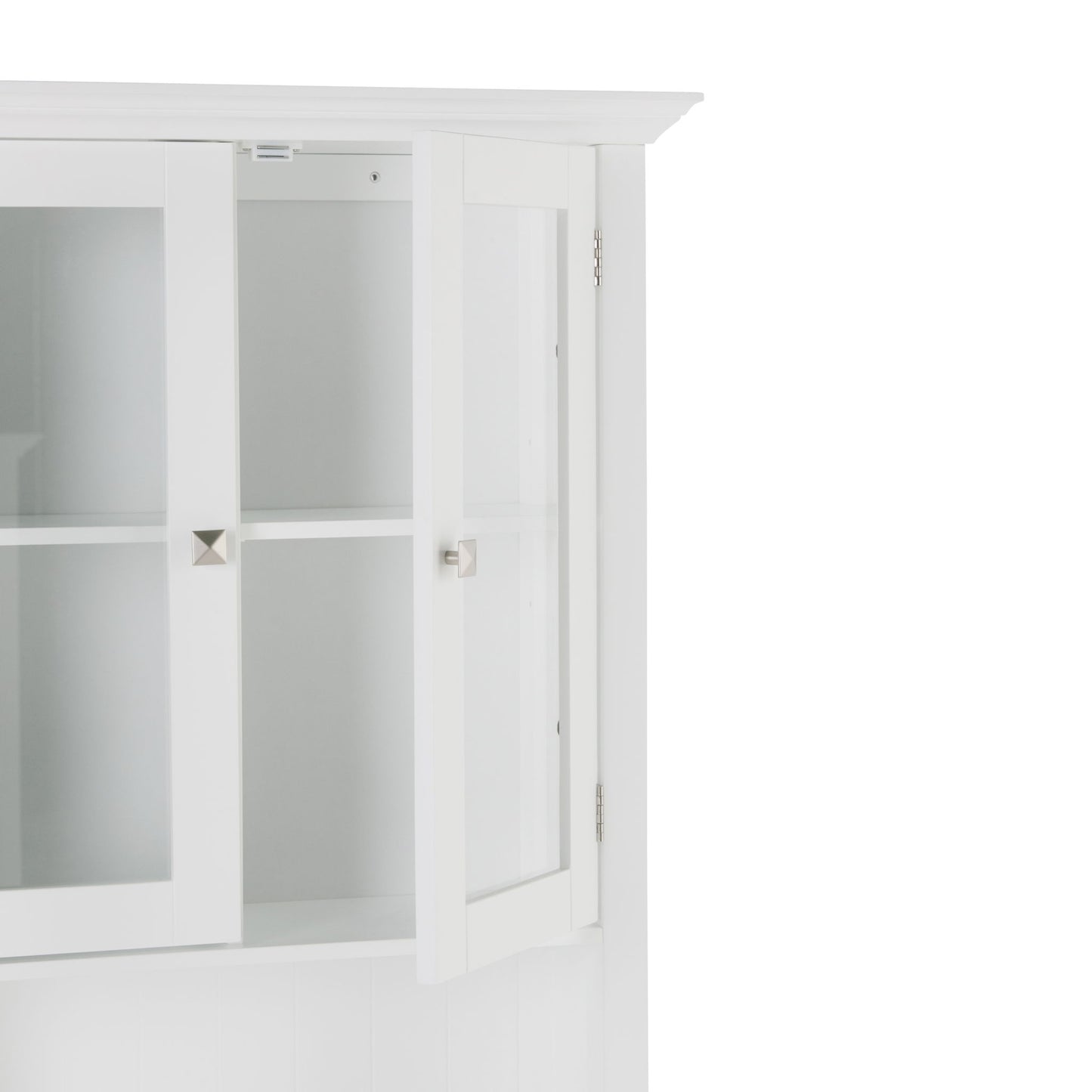 The Acadian Space Saver Cabinet in Pure White features a glass-paned door, empty shelves inside, silver square knobs, and a clean, modern design.