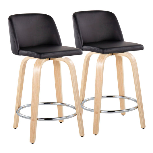 The Toriano set includes two contemporary fixed-height counter stools with swivel and round chrome footrests, featuring black cushioned seats and backs, plus light wooden legs—shown side by side against a white background.