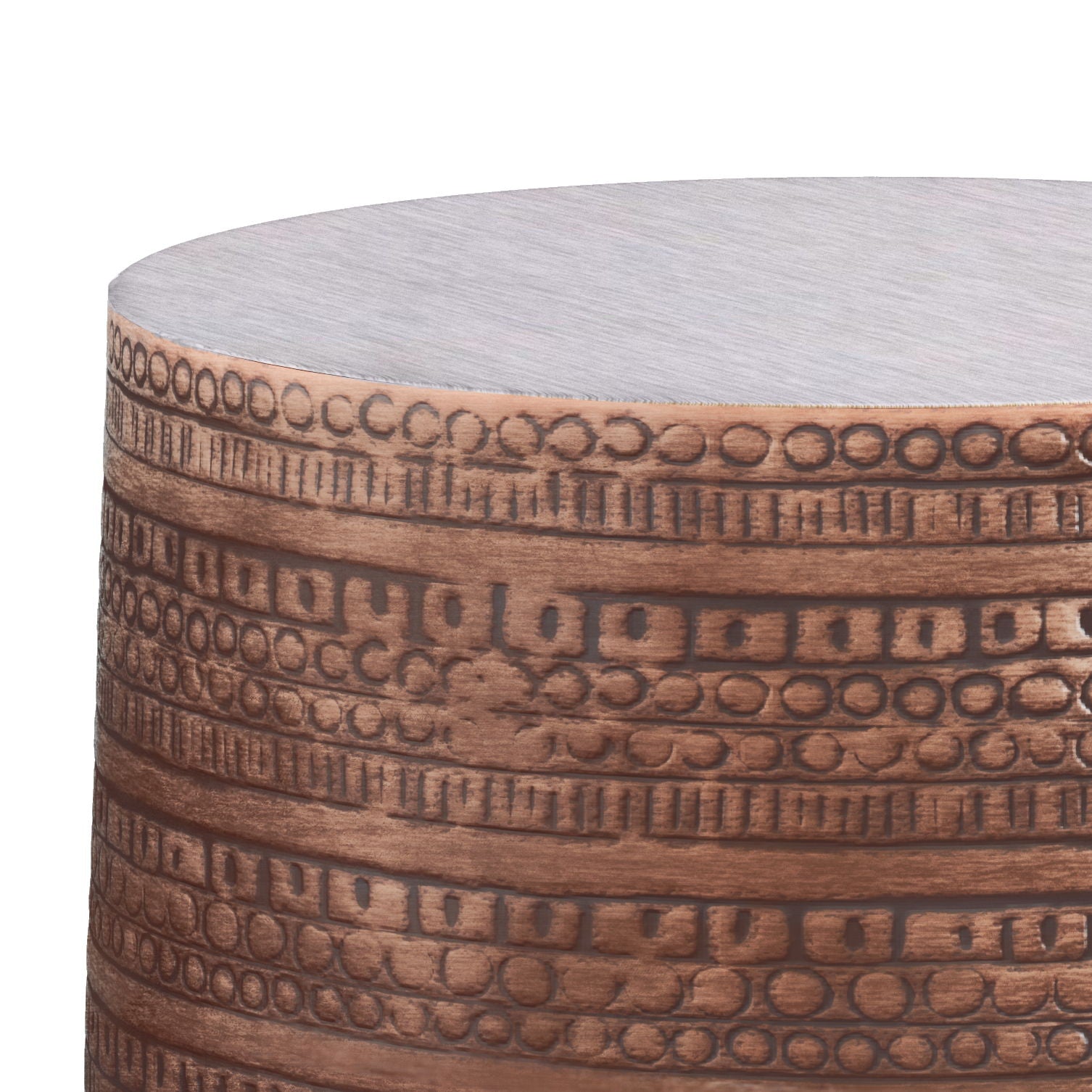 A close-up of the Johnsen Handcrafted Large Metal Accent Table shows its cylindrical shape, etched horizontal bands with circular and rectangular patterns, and a brushed copper-like finish.