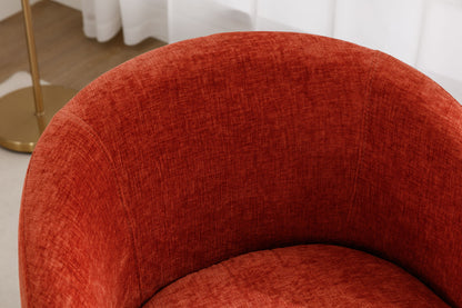 A close-up of the Chenille Fabric Swivel Accent Armchair Barrel Chair with a powder-coated metal ring, upholstered in textured red fabric, alongside a gold floor lamp and white curtains in the background.