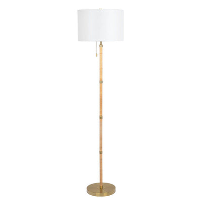 The Stellar Linen Shade Floor Lamp features a round white shade, slender pole with gold accents, circular base, and pull chain switch. Available in Gold, Natural Wood, Rattan, and White finishes.