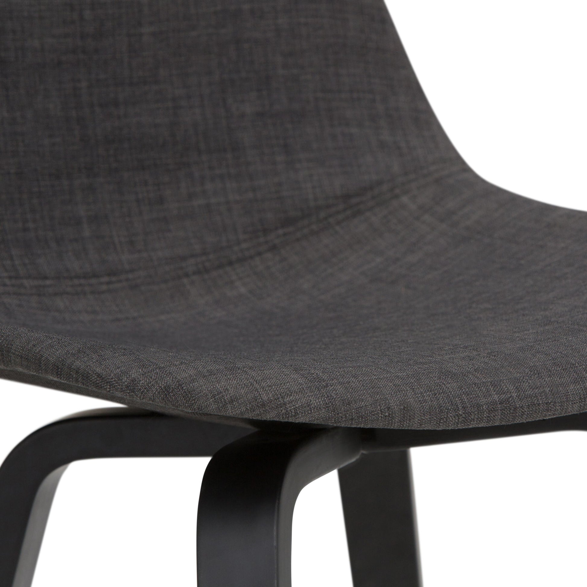 Close-up of the Randolph Bentwood Counter / Bar Height Stool, featuring a curved dark grey upholstered seat and backrest with black wooden legs.