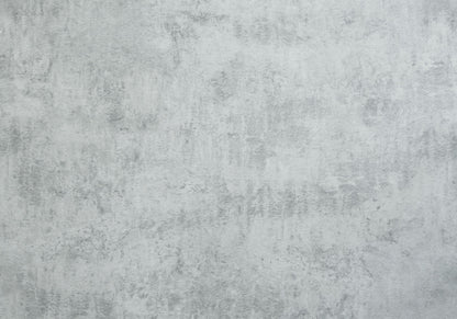 The Table is rectangular with a contemporary design, featuring a light gray finish and subtle shade variations for an industrial, minimalistic look that suits versatile placement.