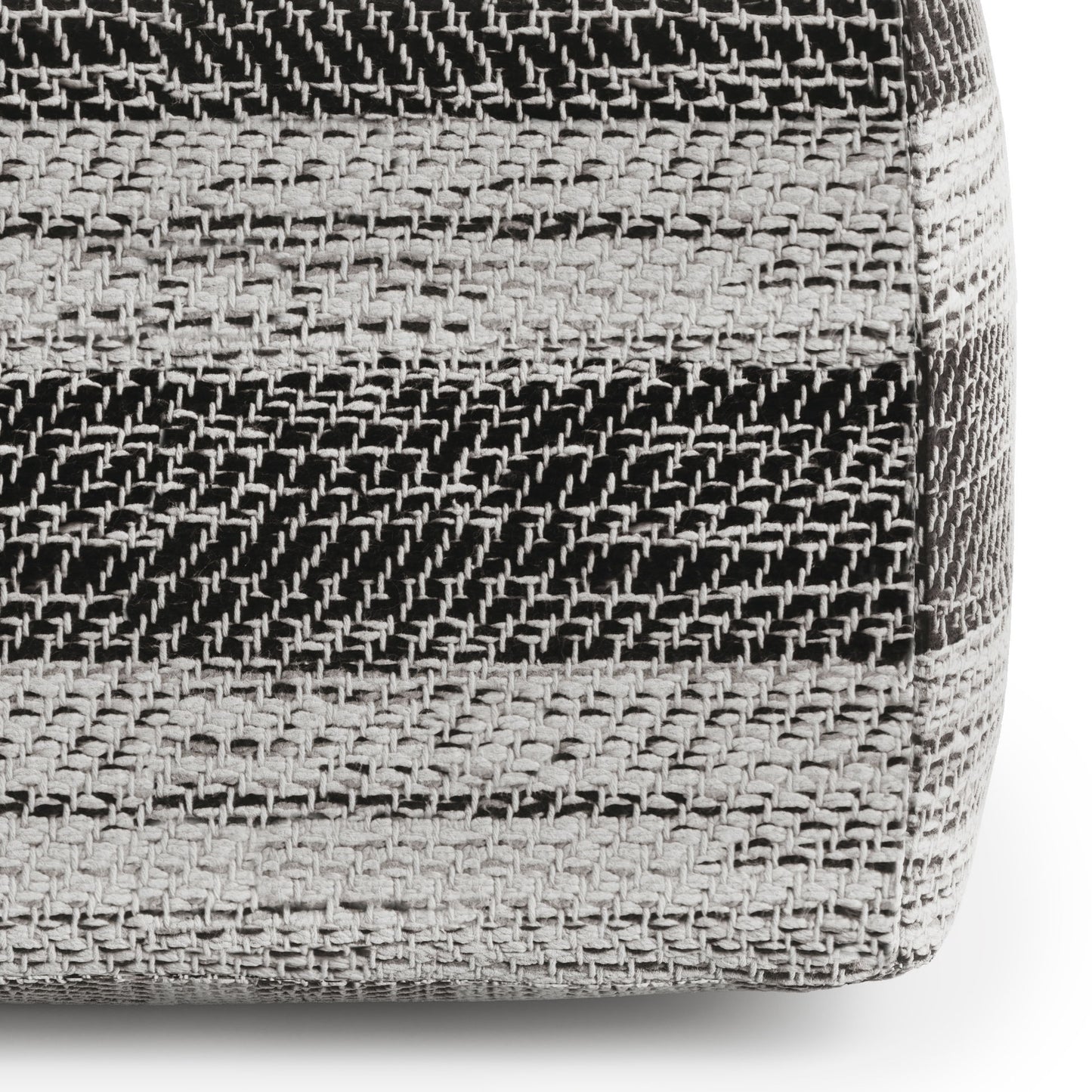 Close-up of Clay - Square Pouf, Upholstered, featuring a woven pattern with horizontal black, gray, and white stripes on its textured fabric side.