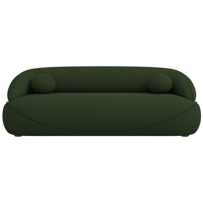 The Andrew Boucle Sofa features a modern design in dark green with rounded edges and two matching cylindrical bolster pillows, shown from the front on a white background.