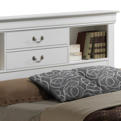 The Louis Phillipe Bookcase Storage Bed features a white headboard with two drawers and an open shelf for books and decor. The bed in front is dressed with brown sheets and a gray pillow adorned with a circular pattern.