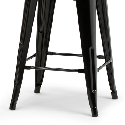 Close-up view of the black metal legs of the Rayne - Multifunctional Metal Stool, featuring crossbars for added support and stability, set against a white background.