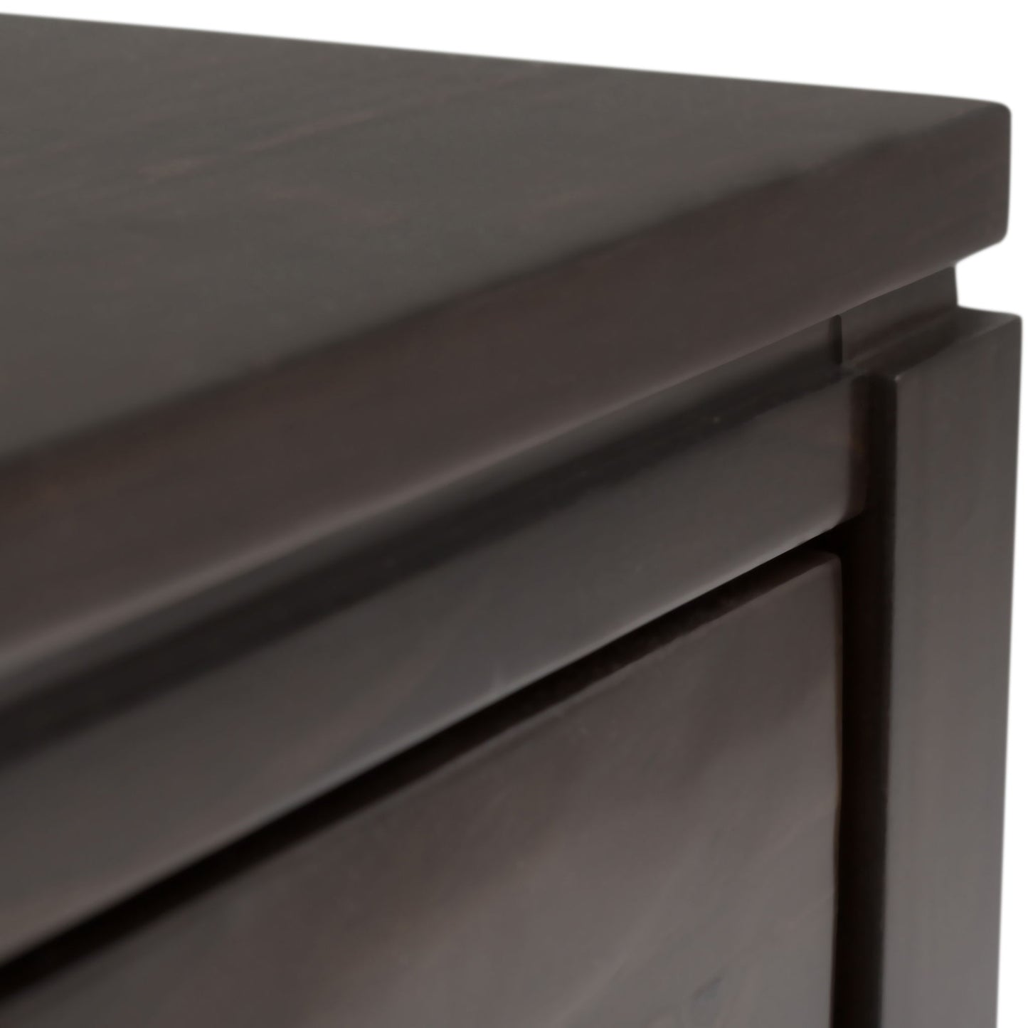 Close-up of the corner of the Cosmopolitan Multipurpose Table, showcasing its smooth dark wood finish and modern, clean edges.