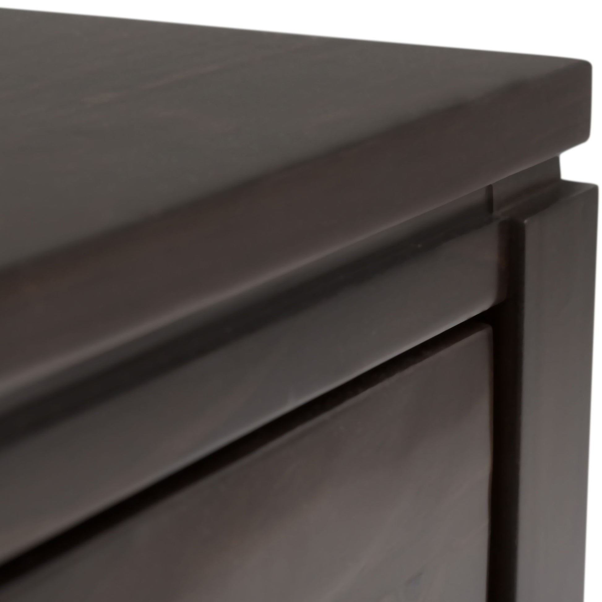 Close-up of the corner of the Cosmopolitan Multipurpose Table, showcasing its smooth dark wood finish and modern, clean edges.