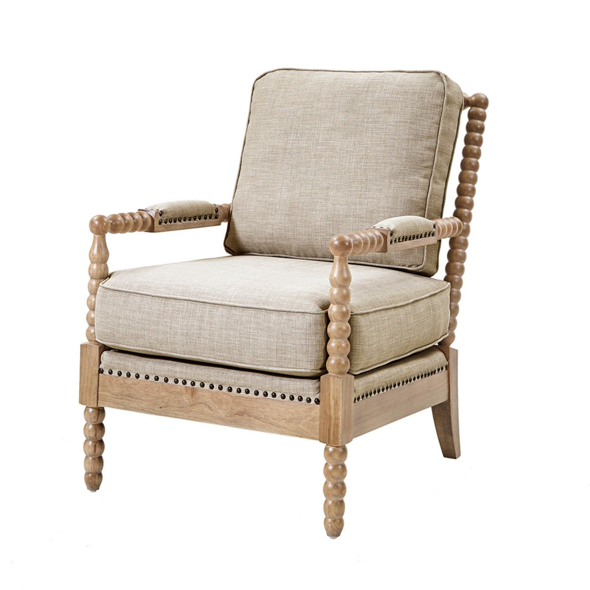 The Arm Chair With Open Back Spindle Design features a beige upholstered seat and backrest, padded armrests, and a light wooden frame with distinctive rounded spindle detailing on the arms and legs.