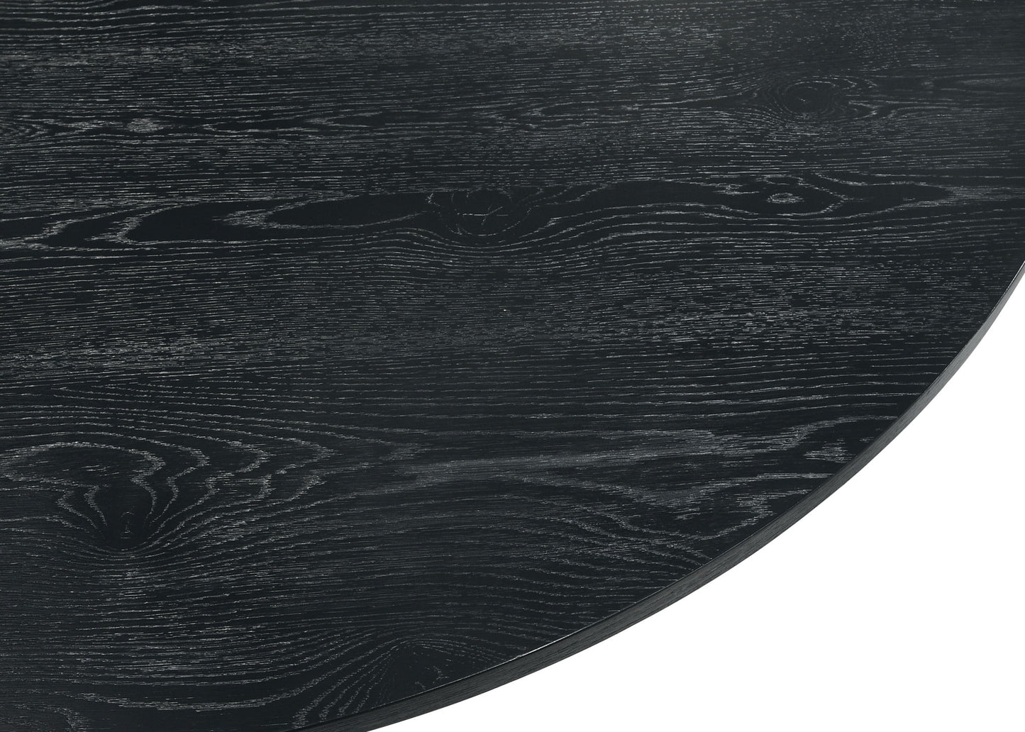 Close-up of the Jasper - 47" Round Dining Table Set, featuring a dark wood tabletop with visible grain patterns and natural swirls. Only part of the table appears in the image.
