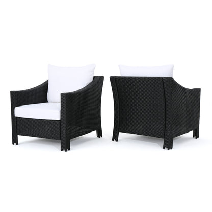 Two black Antibes armchairs with water resistant seat and back cushions, shown from the front and back against a white background.